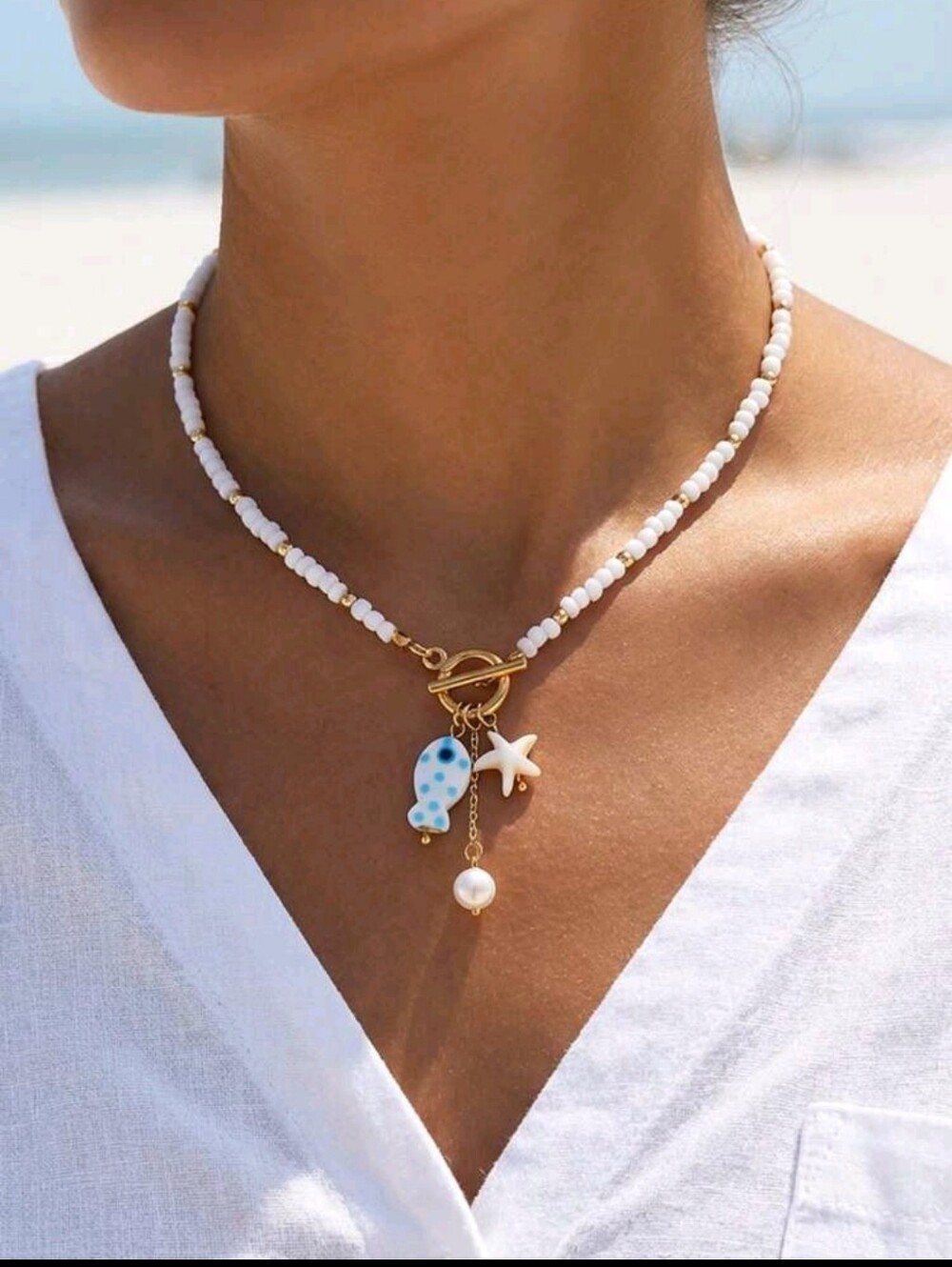 BRAND NEW ** Gold Toggle White Bead Necklace with Blue Polka Dot Charm